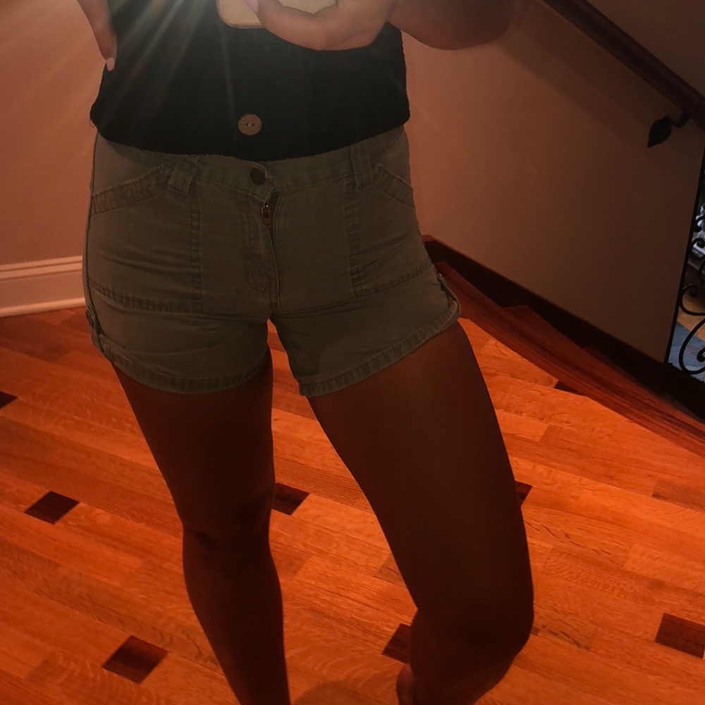 Olive green shorts.